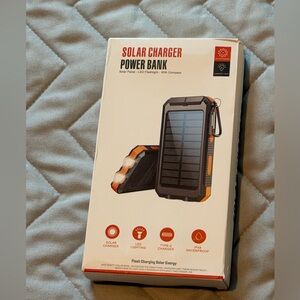 NEW Solar Charger Power Bank flashlight and compass - Black and Orange